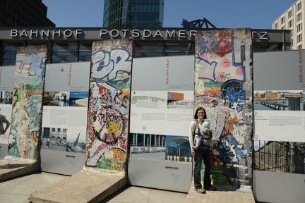 Erynn with a piece of the Wall in Potsdamer Platz